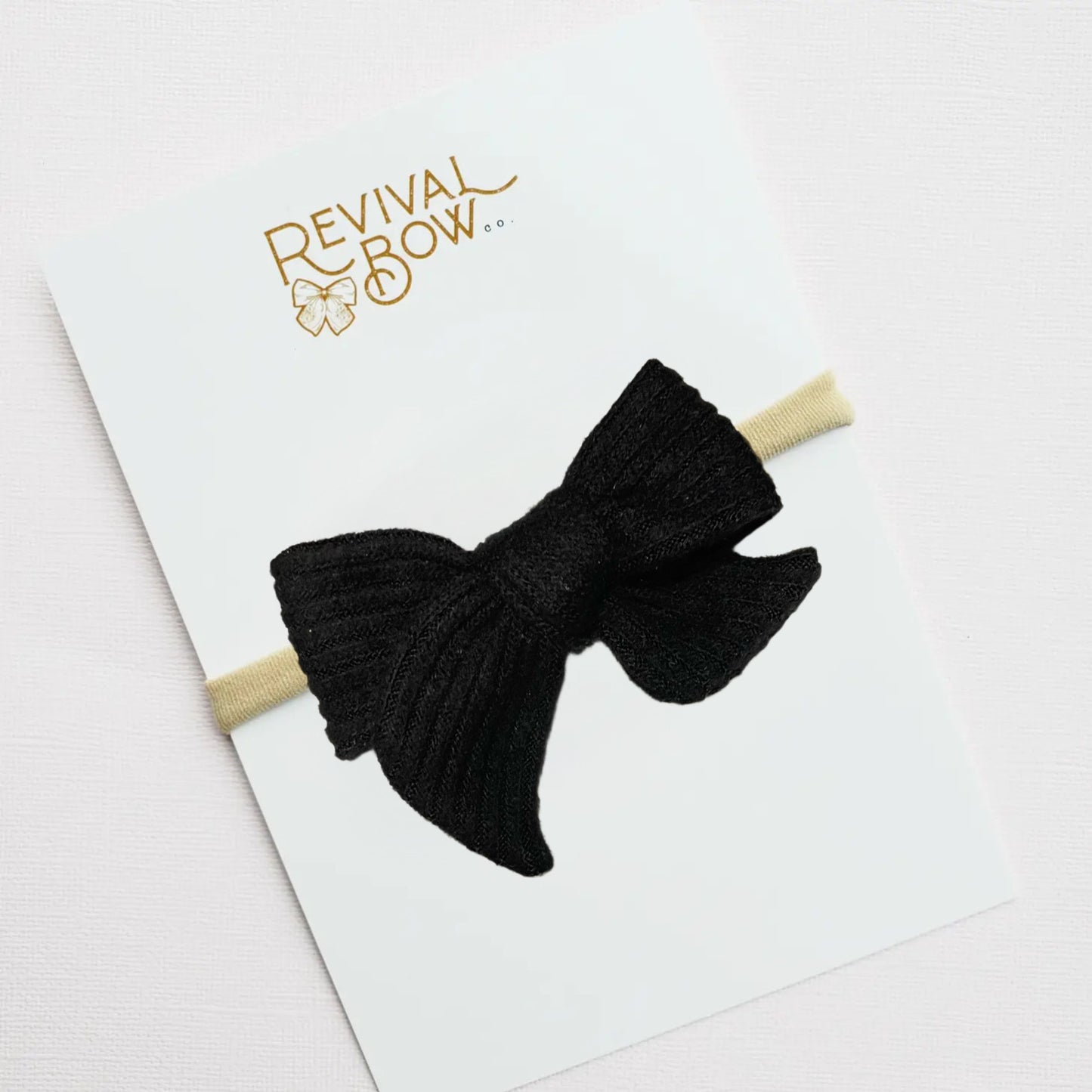 Black Rib Small Pinwheel Bow on Nylon Headband