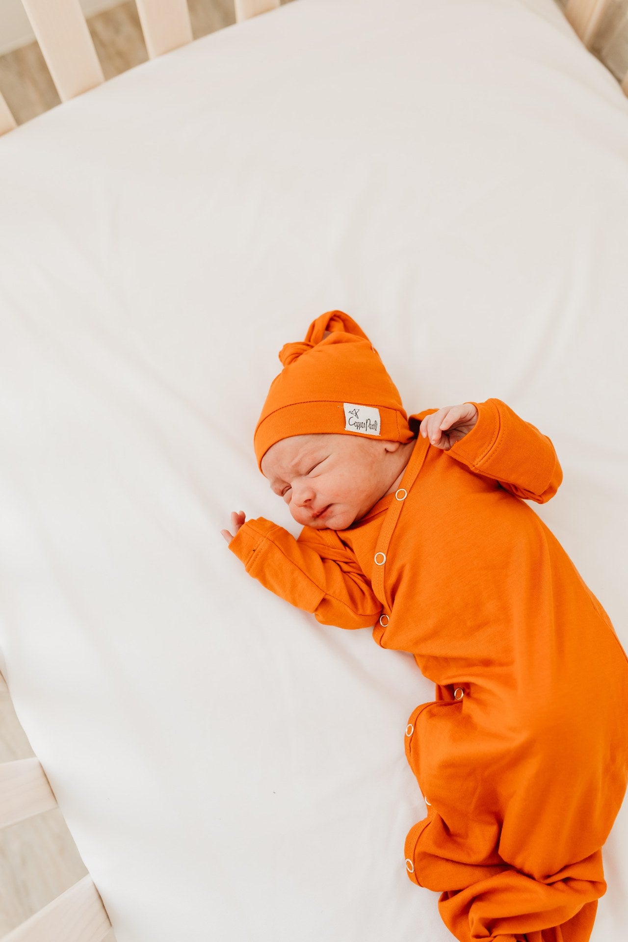 Copper Pearl Top Knot Hat 0-4mo - Blaze