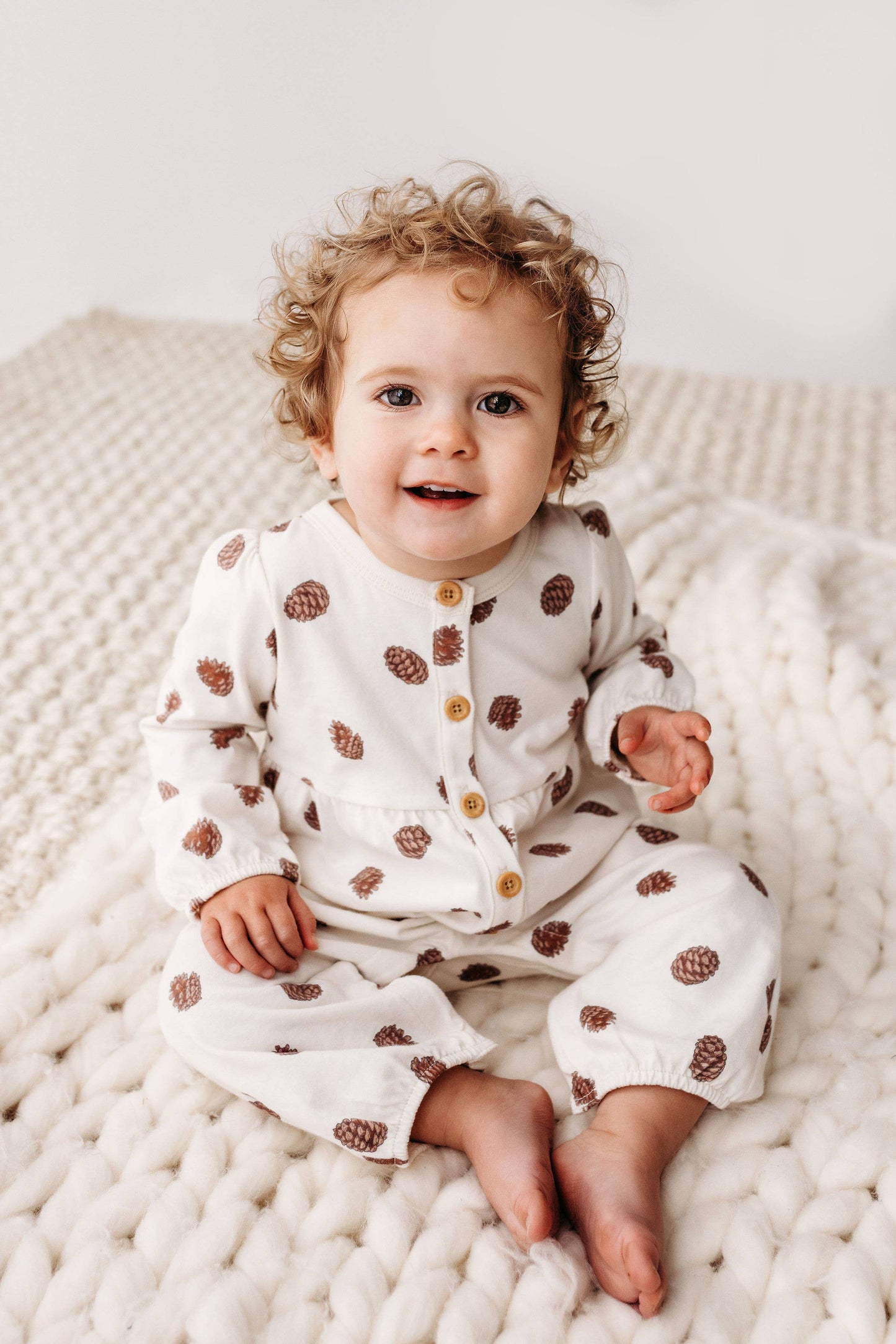 PNW Baby Gathered Button Romper- Pinecones