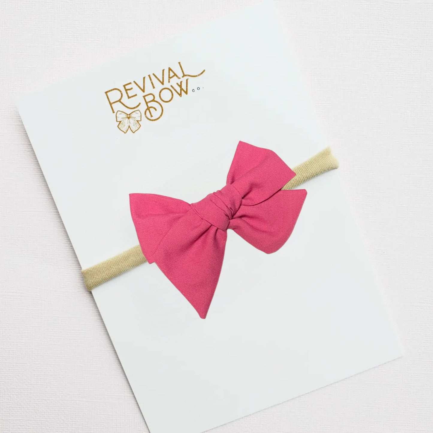 Raspberry Small Pinwheel Bow on Nylon Headband