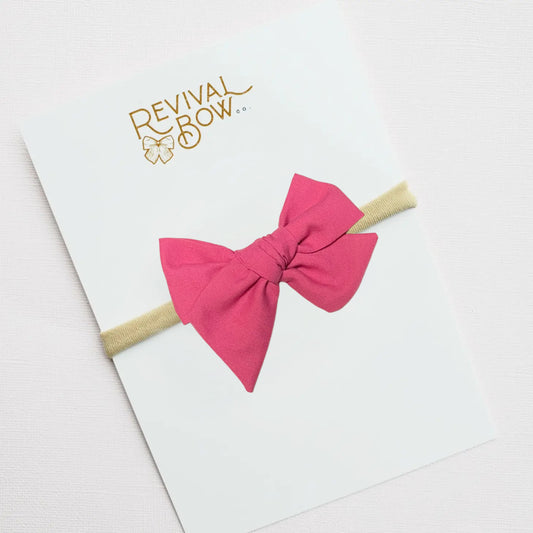 Raspberry Small Pinwheel Bow on Nylon Headband