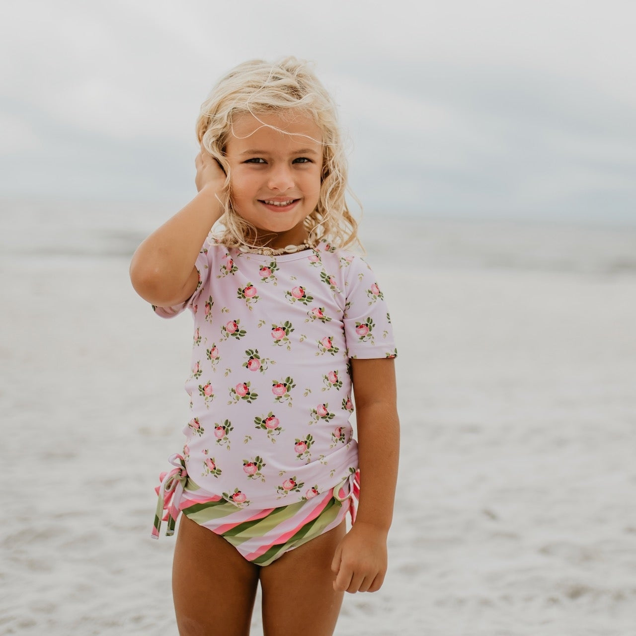 Light Pink Floral Rash Guard with Ruffle Bottoms